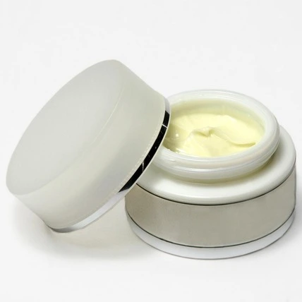 image of proofly thc body cream with the lid off on a white background