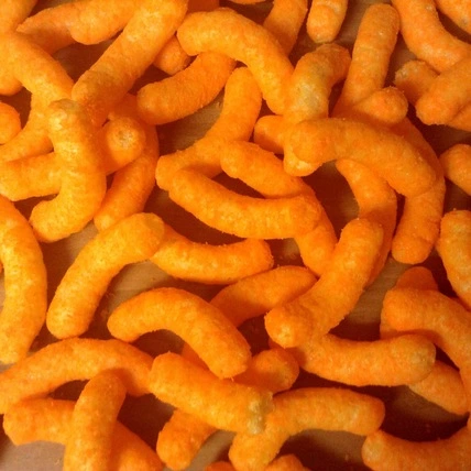 zoomed in image of snoop dogg o.g. bar-b-que cheddar puffs