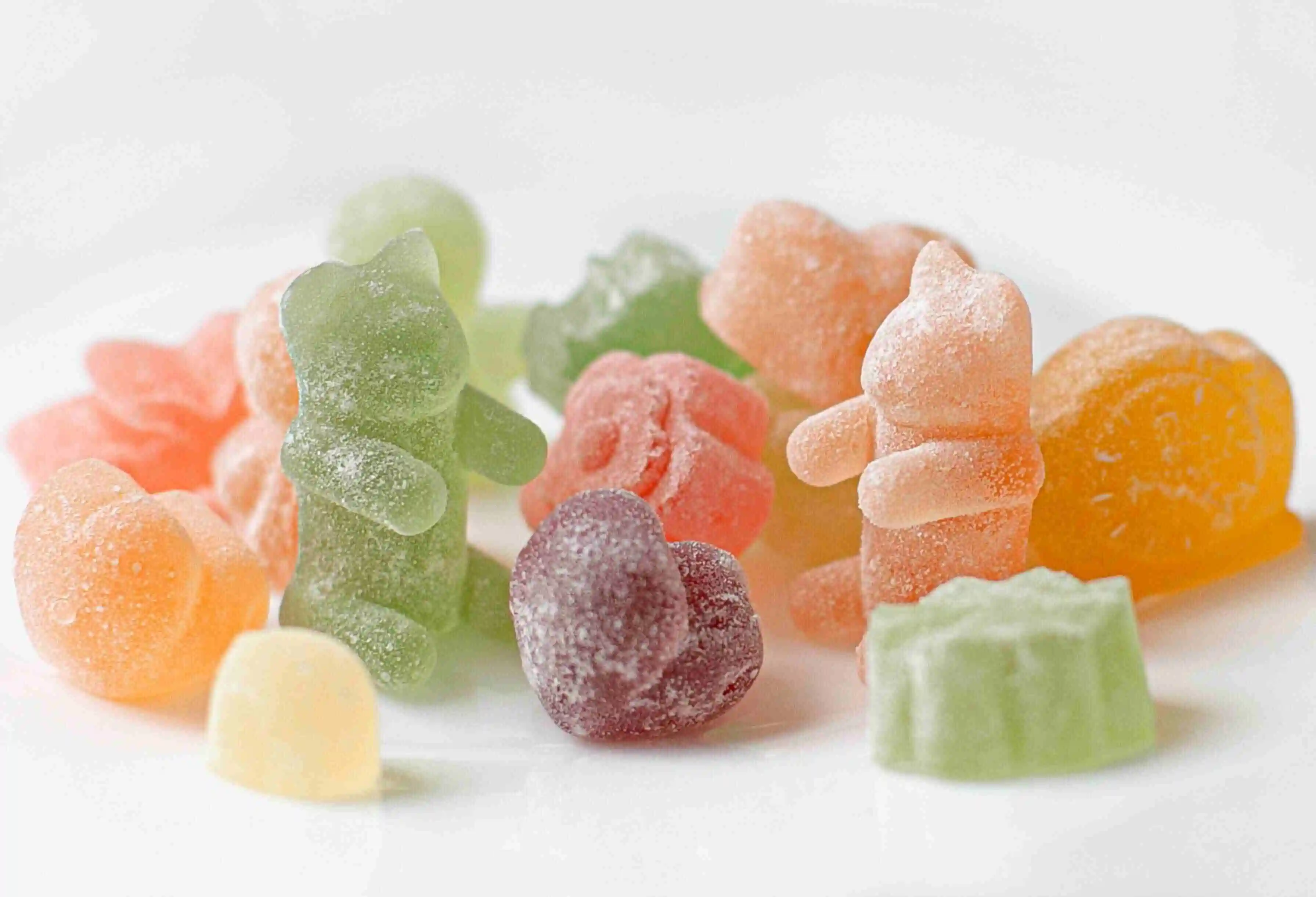 cannabis edible gummy bears on a white background