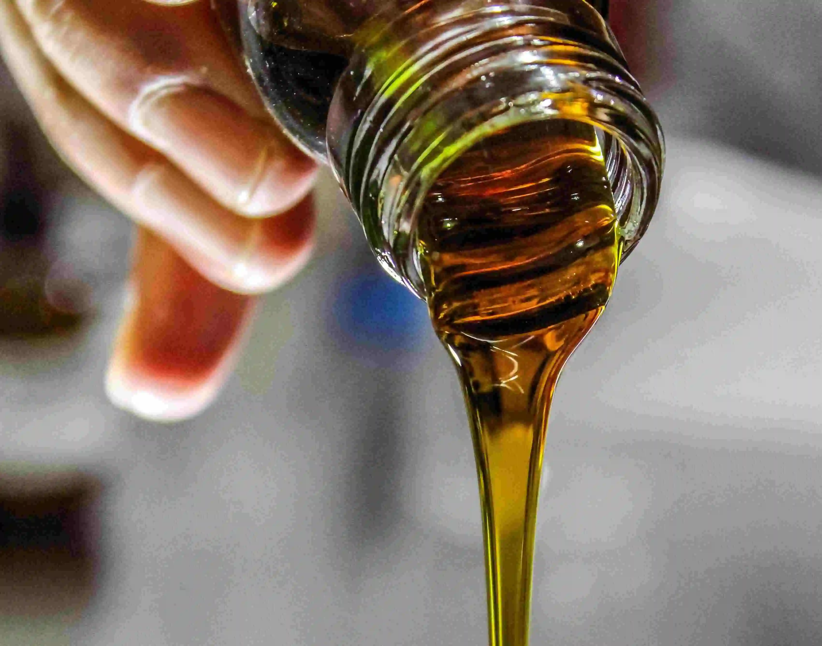 thc oil spilling out of a cannabis topicals bottle